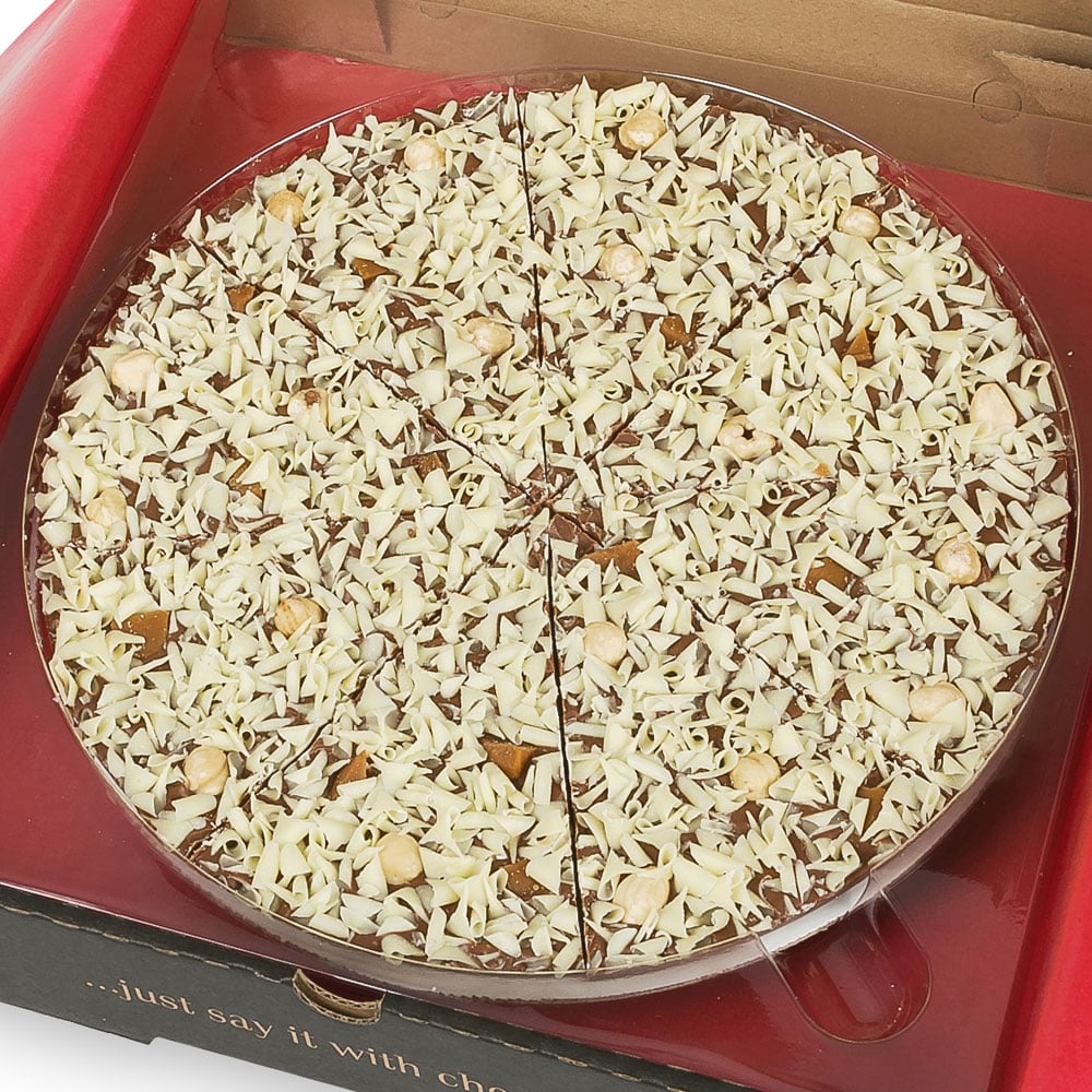 Gone Nuts Chocolate Pizza has a milk chocolate base and is topped with crunchy hazelnuts and toffee pieces.